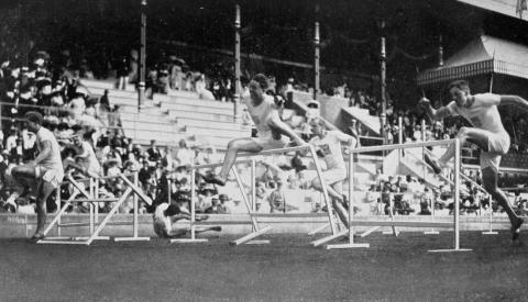 1912 Athletics men's 110 metre hurdles final, with several of the men falling over.