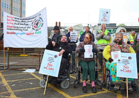 Disabled people protesting