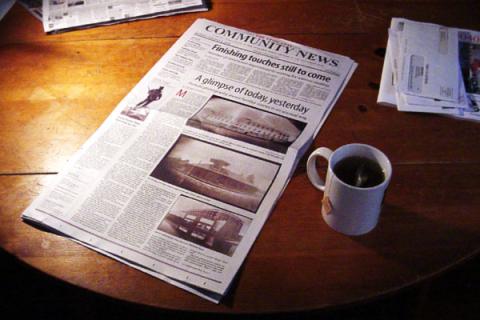 picture of newspaper and cup of tea