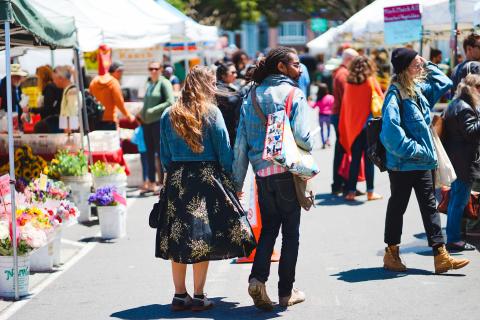 Customers walking in a market