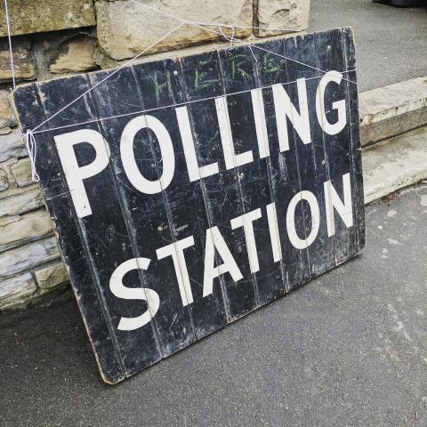 A photo of a polling station sign