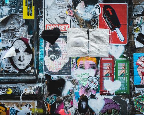 Wall of posters and grafiti