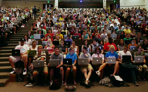 Lecture hall with students and their mac computers