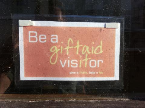 Gift Aid sign in a window