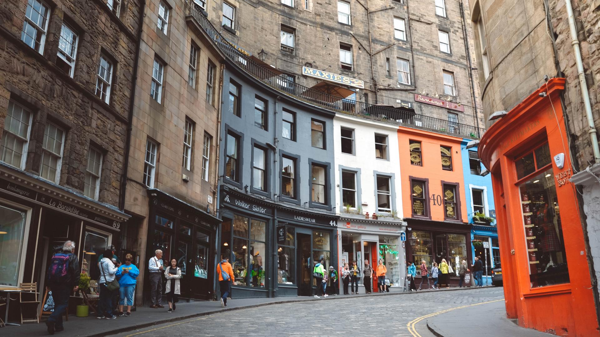 A winding street lined with colourful buildings