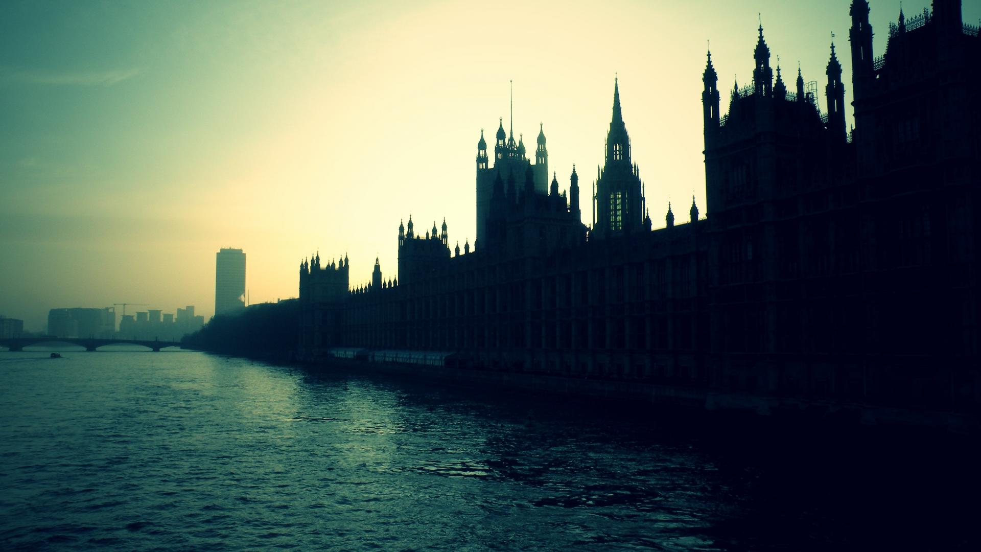 Houses of Parliament against a bright sky