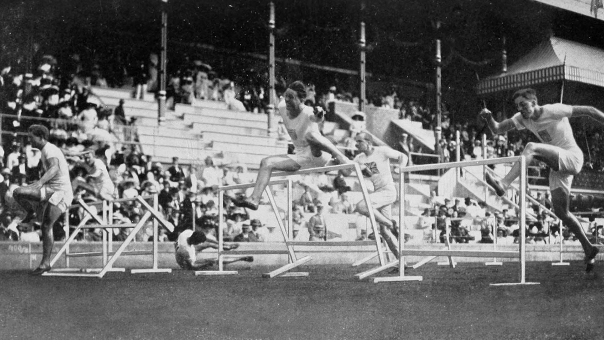 1912 Athletics men's 110 metre hurdles final, with several of the men falling over.
