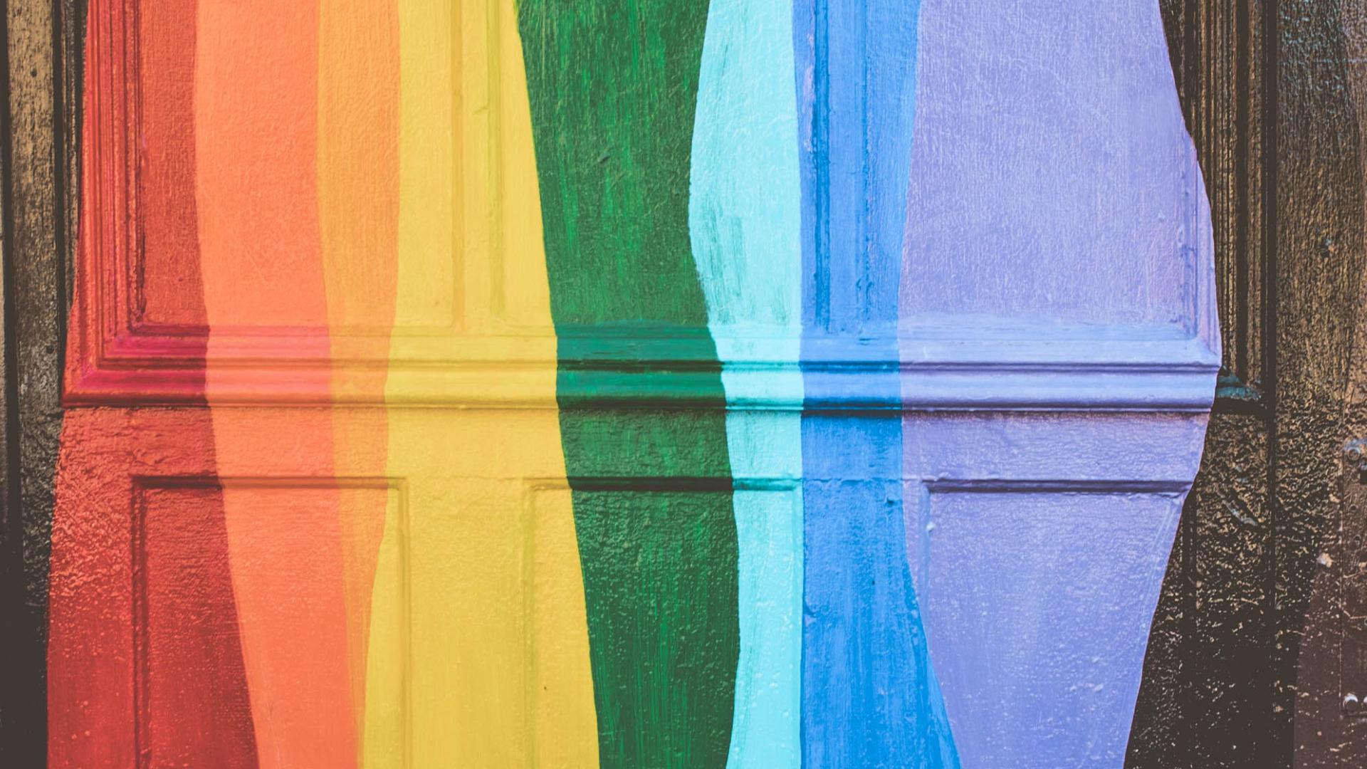 red, yellow, green and blue lines painted on a door