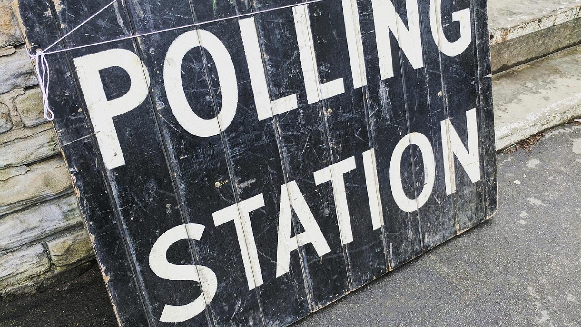 A photo of a polling station sign