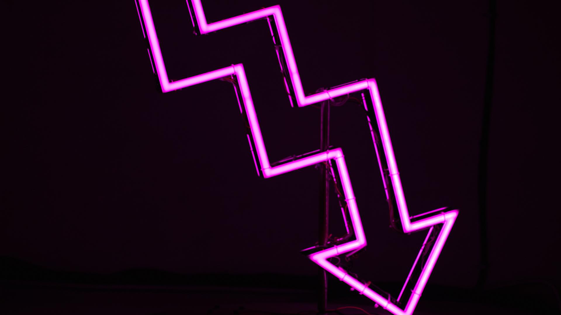 Neon arrow pointing downwards